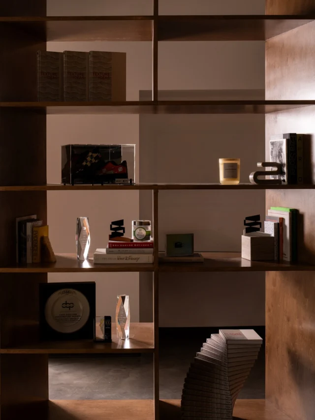 Warm and cool tones weave a balanced palette throughout our studio headquarters. Interconnected communal spaces unfold as a sequence, revealing layers of connection and collaboration among people across projects. At the heart, a custom bookshelf anchors the space—part screen, part storyteller—holding objects and moments that reflect our identity and values.

Photography: Seamus Payne @seamuspayne 

#834orange #schenkelshultz #headquarters #design #palette