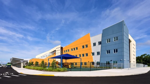Conceived for a district in rapid growth, Cross Prairie K-8 School unites efficiency and performance within a footprint shaped for adaptability. 

Volumes fold and interlock in gestures reminiscent of origami, their overlapping forms infused with vibrant color that animates the exterior and sparks curiosity. Inside, corridors become immersive pathways where bold hues and shifting patterns guide movement while transforming circulation into experience.

Anchored by a media center and maker space, the design fosters exploration and innovation, placing creativity at the heart of learning.

Photography: @grossmanphoto 

#schenkelshultz #education #innovation #design